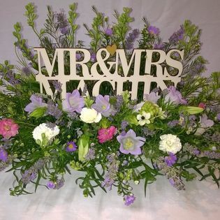 Mr & Mrs Wedding day Top Table flower arrangement 