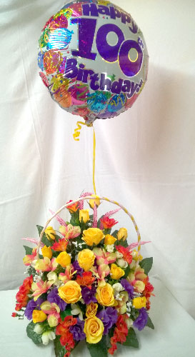 Silk flower basket with balloon