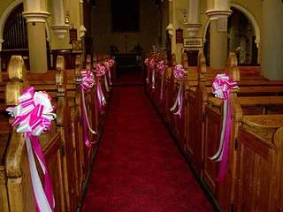 Ribbon bows with trails pew ends