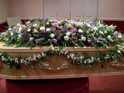 Funeral flowers coffin arrangement